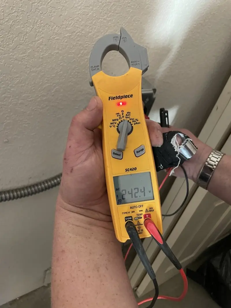 Voltage testing with clamp meter during Hot Tub / Pool Electrical Wiring in Spring Hill